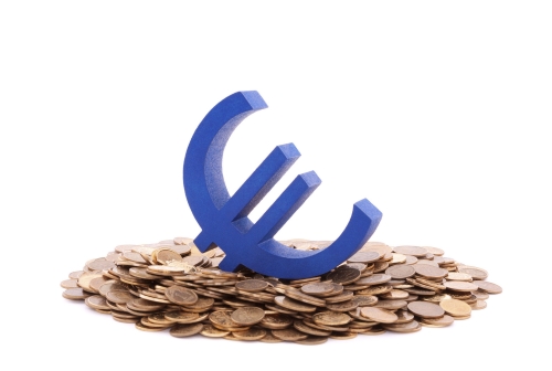 Euro-Zeichen auf Centstücken liegend